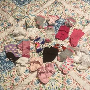 20 pairs of baby socks.  6-12 months